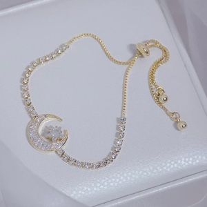 Moon and star 14k gold plated bracelet.